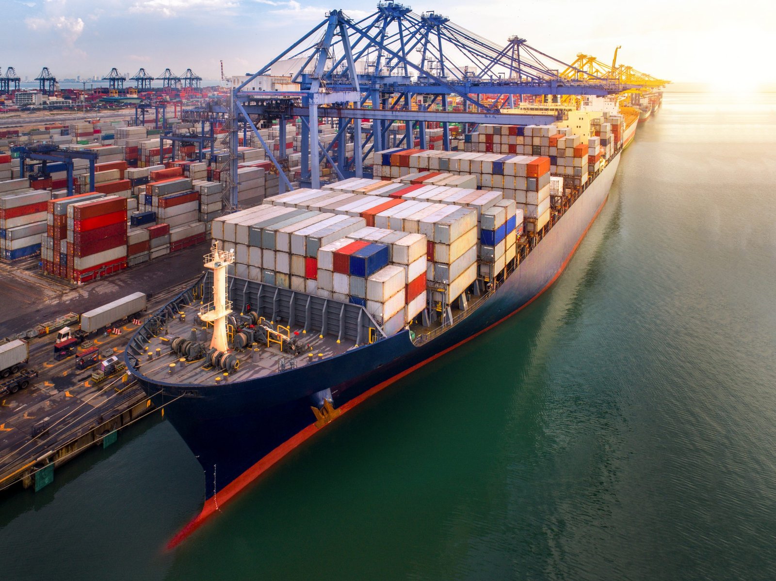 Container ship carrying export cargo at an international port